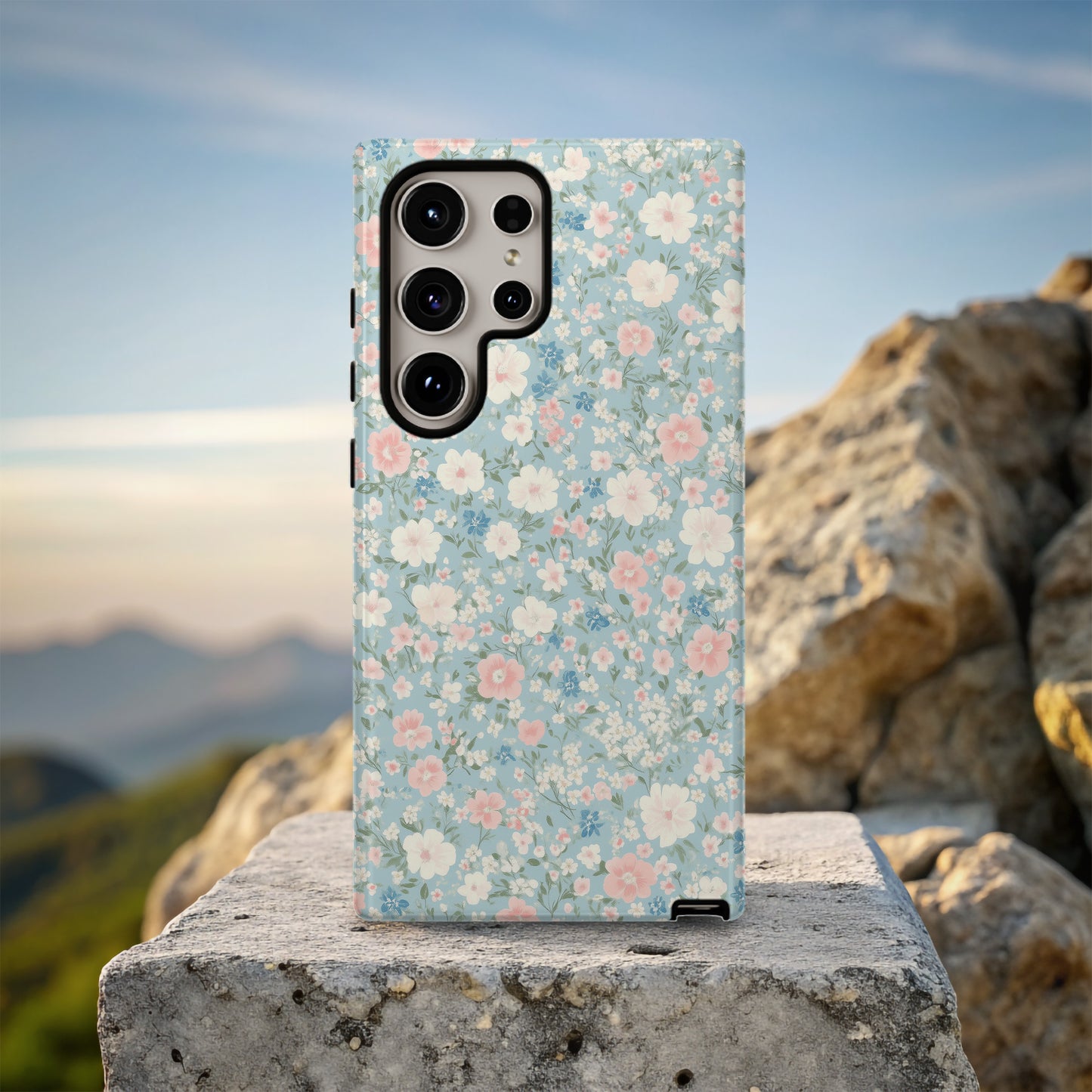 Pastel Meadow Floral Case – Soft Blue Background with Delicate Wildflowers