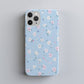 Pastel Floral Sky Phone Case – Soft Blue Background with Tiny Flowers