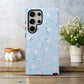 Pastel Floral Sky Phone Case – Soft Blue Background with Tiny Flowers