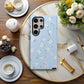 Pastel Floral Sky Phone Case – Soft Blue Background with Tiny Flowers