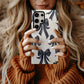 Midnight Ribbon Case – Elegant Black Bows on Cream