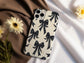 Midnight Ribbon Case – Elegant Black Bows on Cream