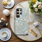 Pastel Meadow Floral Case – Soft Blue Background with Delicate Wildflowers